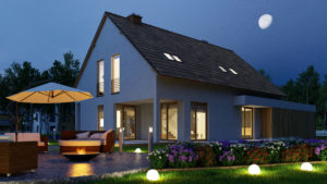 House at night with landscape lighting